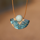 Reef curved beach necklace on beach